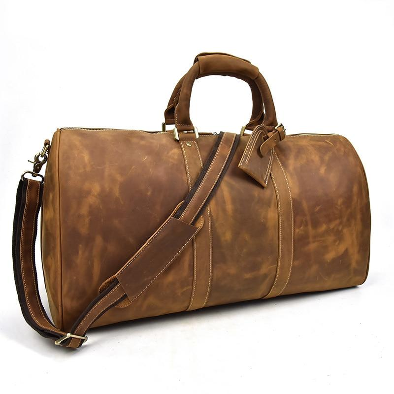 Start2Finish Bjarke Weekender leather duffle bag, handcrafted with smooth leather, featuring sturdy handles and a spacious design.