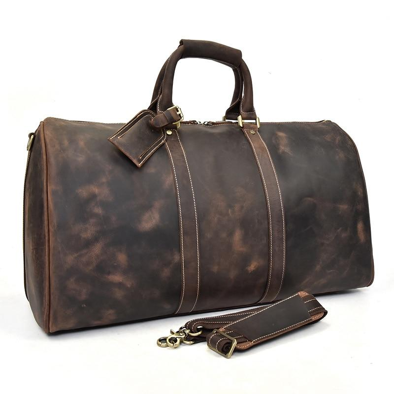 Start2Finish Bjarke Weekender handcrafted leather duffle bag with sturdy handles and spacious interior for travel accessories.