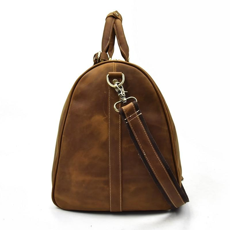 Start2Finish Bjarke Weekender handcrafted leather duffle bag with sturdy handles and spacious main compartment.