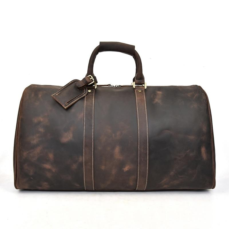 Start2Finish Bjarke Weekender leather duffle bag with sturdy handles and spacious main compartment, handcrafted accessories for travel.