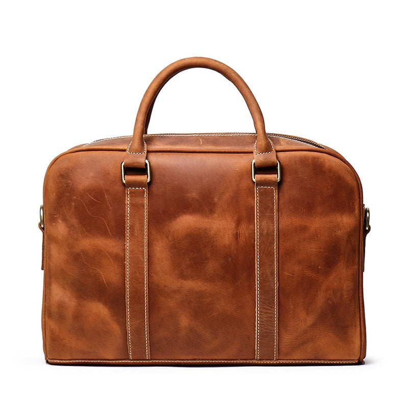 Start2Finish Bjorn Leather Laptop Bag with vintage brown leather finish, structured briefcase with handles and buckle accents.