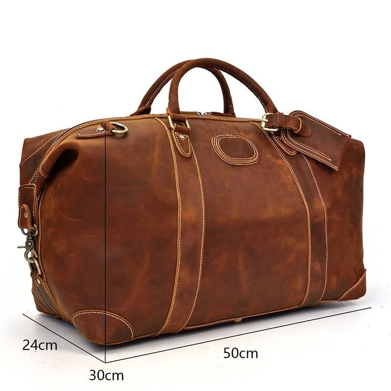 Start2Finish Eira Duffle Bag made of vintage leather, stylish weekender accessory with handles and spacious interior.