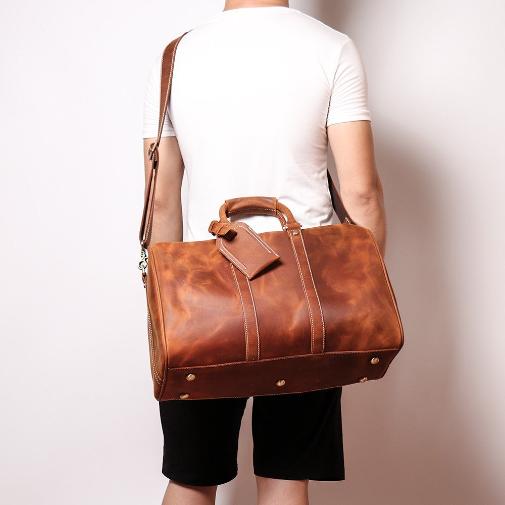 Start2Finish Brandt Weekender small leather duffle bag with handles and zip closure, showing its compact and stylish design.