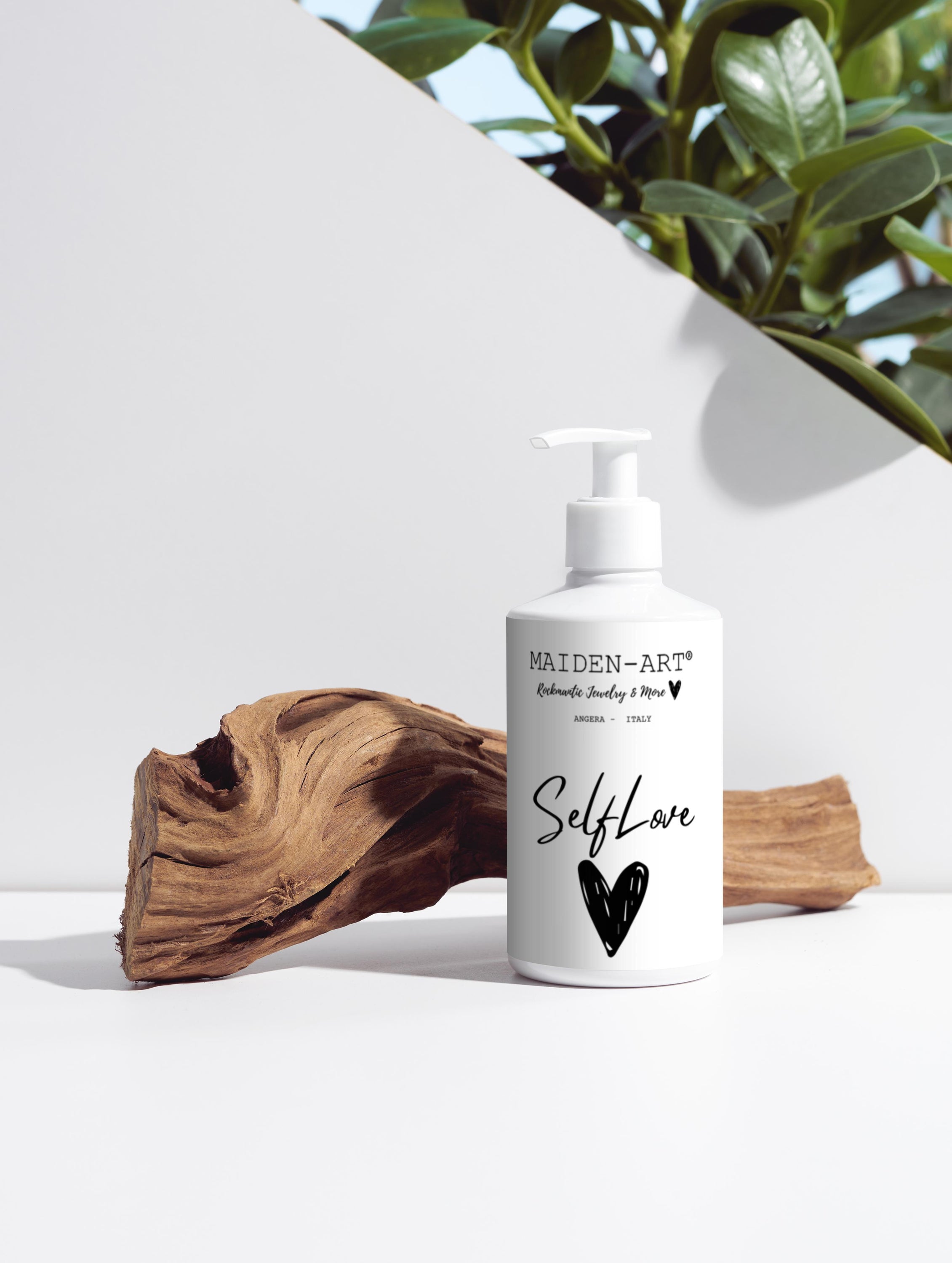 Pink Lucky Self-Love Bliss moisturizing body lotion bottle with soft pink packaging and floral design, ideal for nourishing skin.