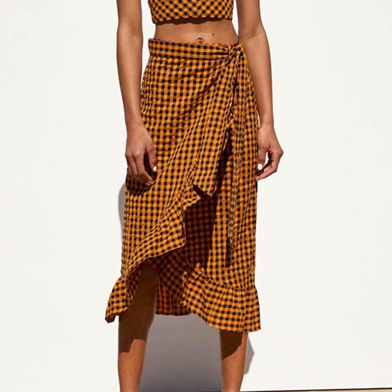 Yellow plaid ruffle midi skirt for women with high waist and bow detail by Jade, showcasing a stylish and elegant design.