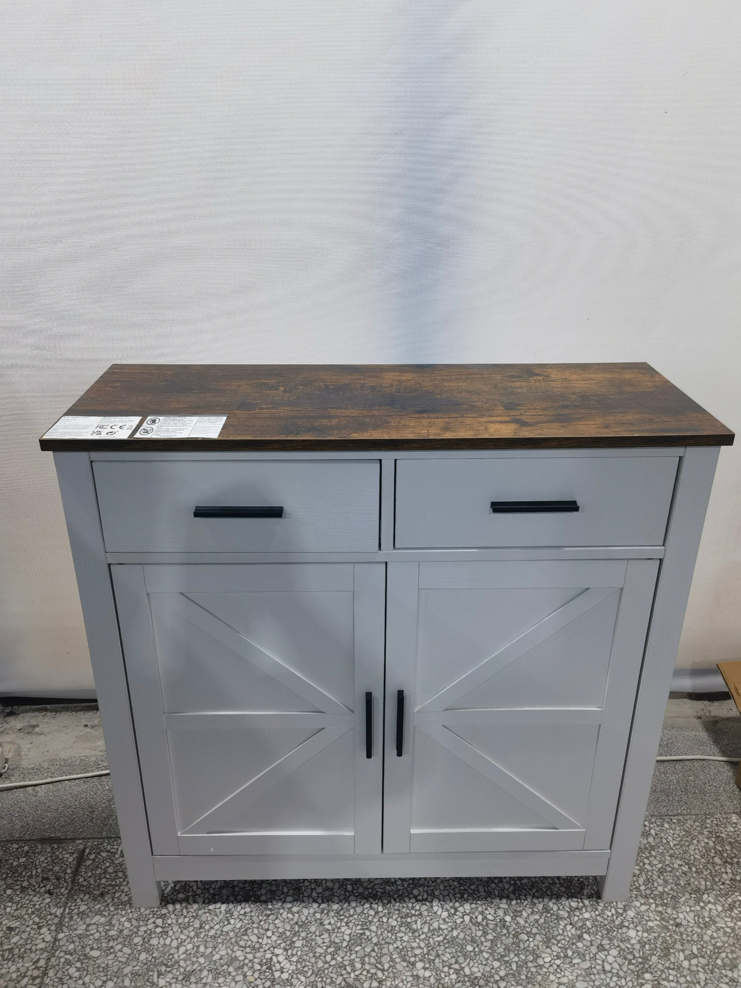 Modern farmhouse kitchen storage cabinet by Start2Finish with two drawers and two doors, showcasing a sleek, functional furniture piece.