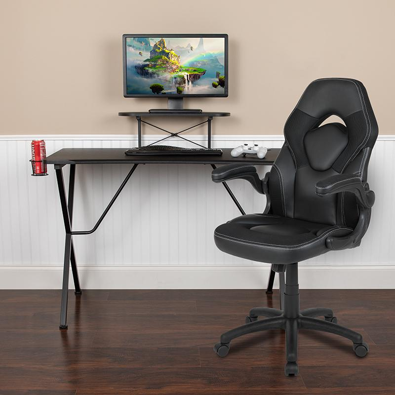 Start2Finish black gaming desk with matching black racing chair set, featuring sleek furniture design and ergonomic features.