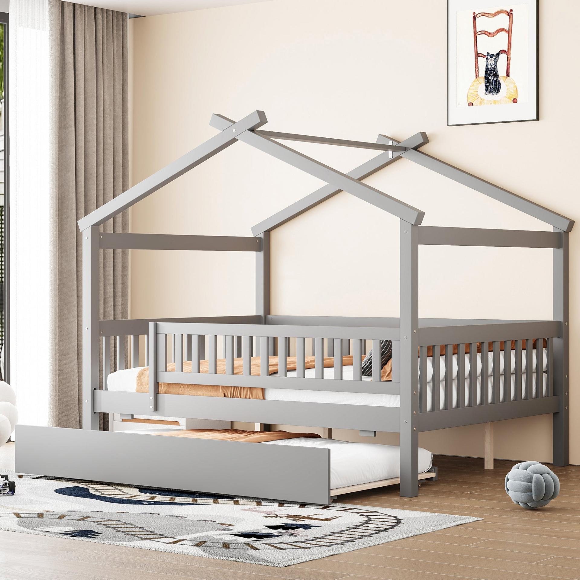 Wooden house-style bed frame with pull-out trundle drawer and slatted support, by Start2Finish, shown in a cozy bedroom setting.