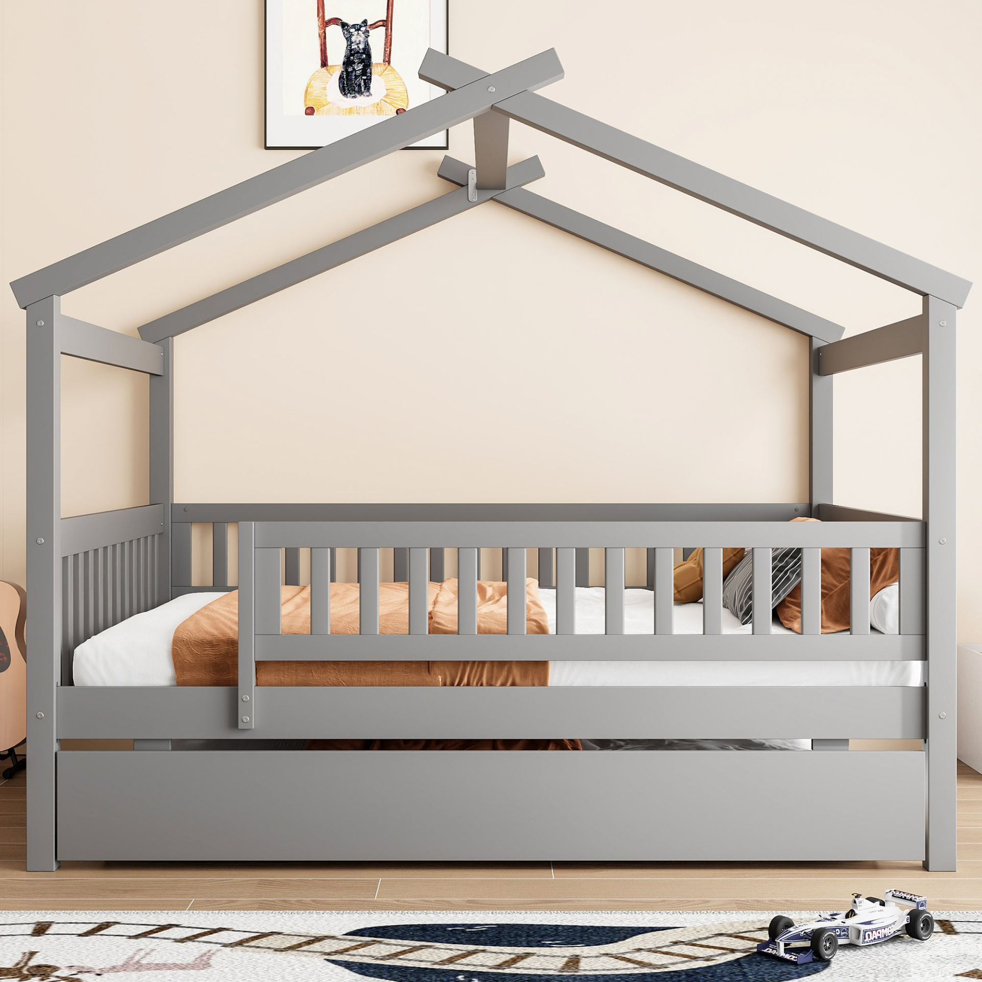 Wooden house-style bed frame with pull-out trundle drawer and slatted support, by Start2Finish.