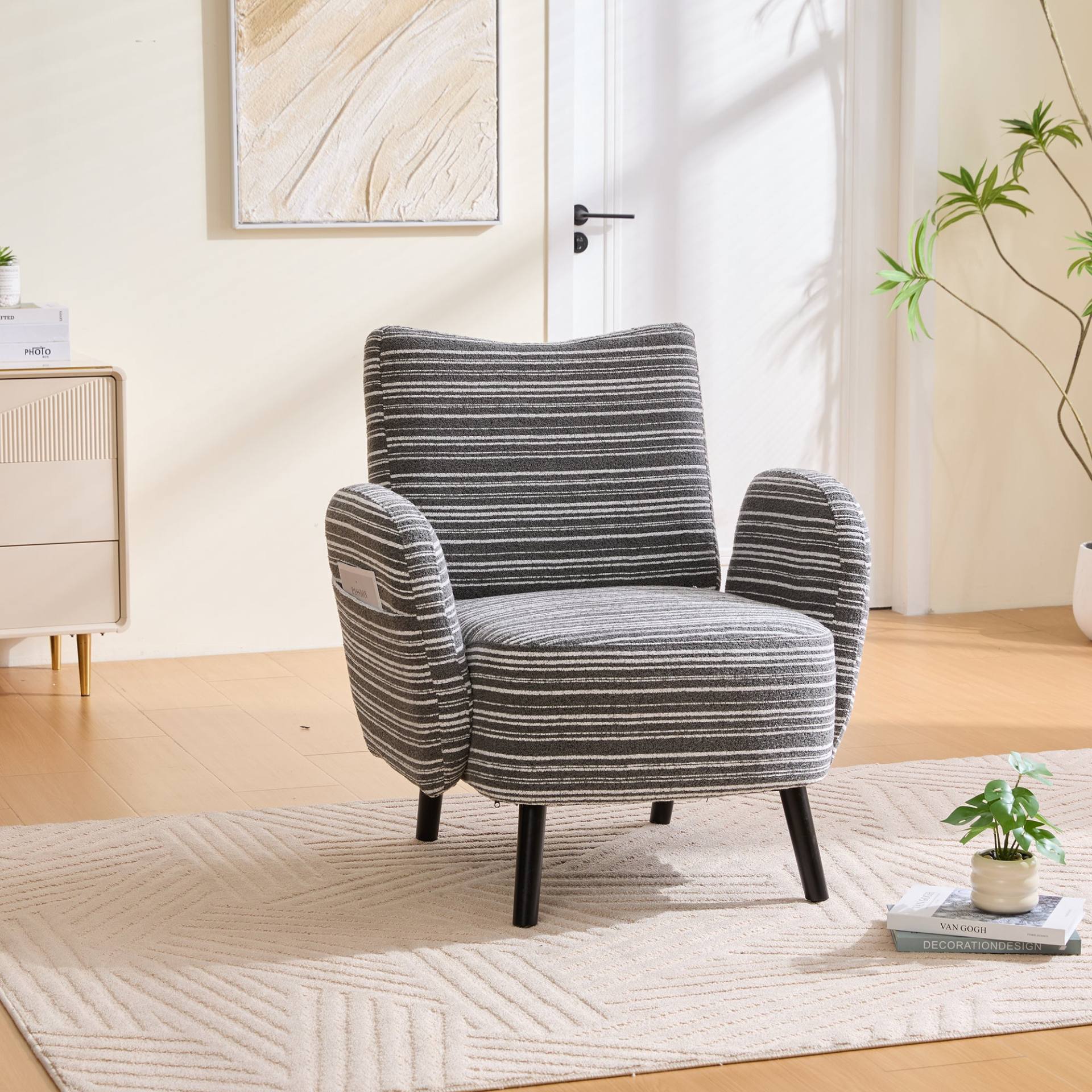 Modern armchair by Start2Finish with sanded fabric, side storage pocket, and solid wood legs, perfect for contemporary living spaces.