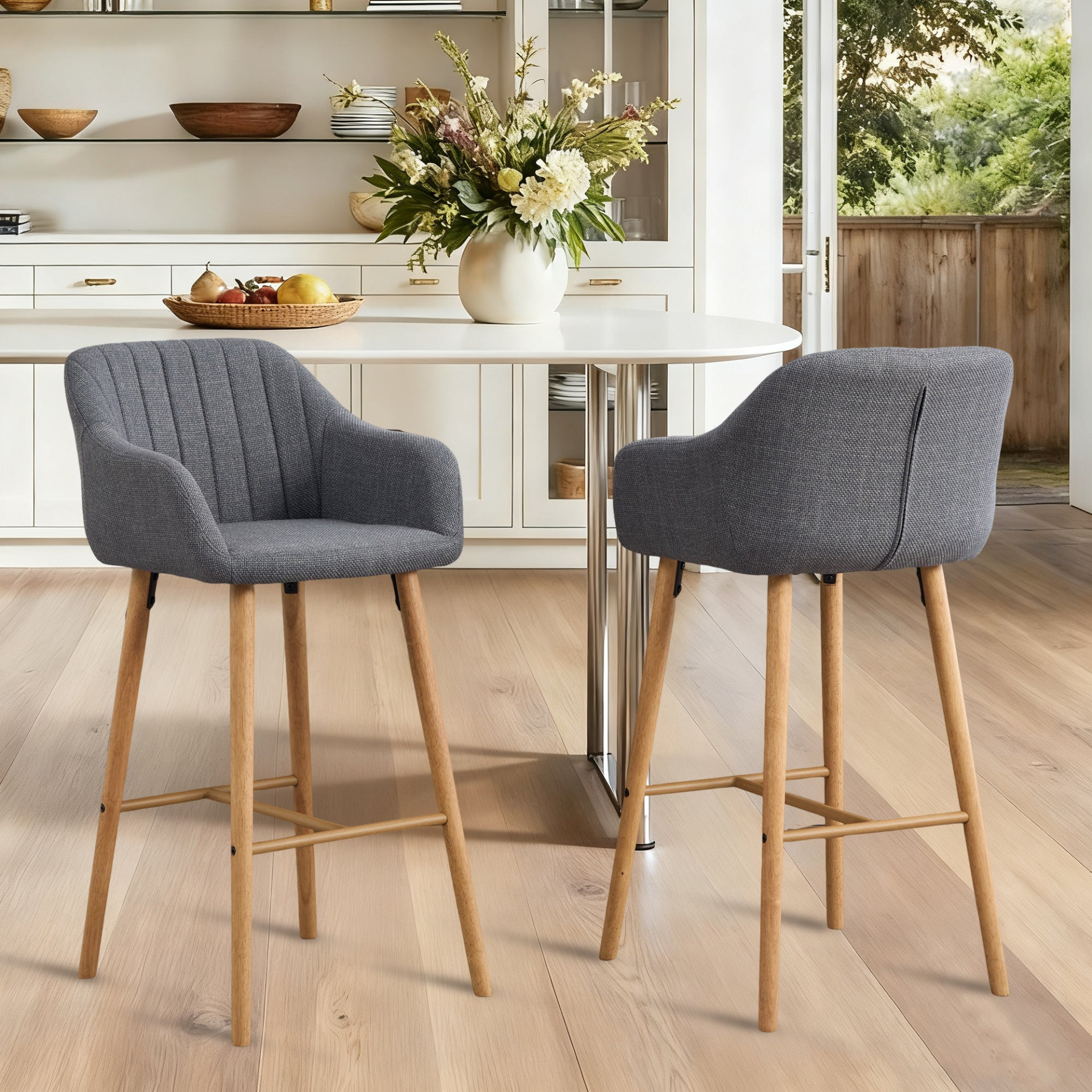 Modern linen upholstered bar stool with backrest, armrests, footrest, and solid wood legs by Start2Finish furniture.