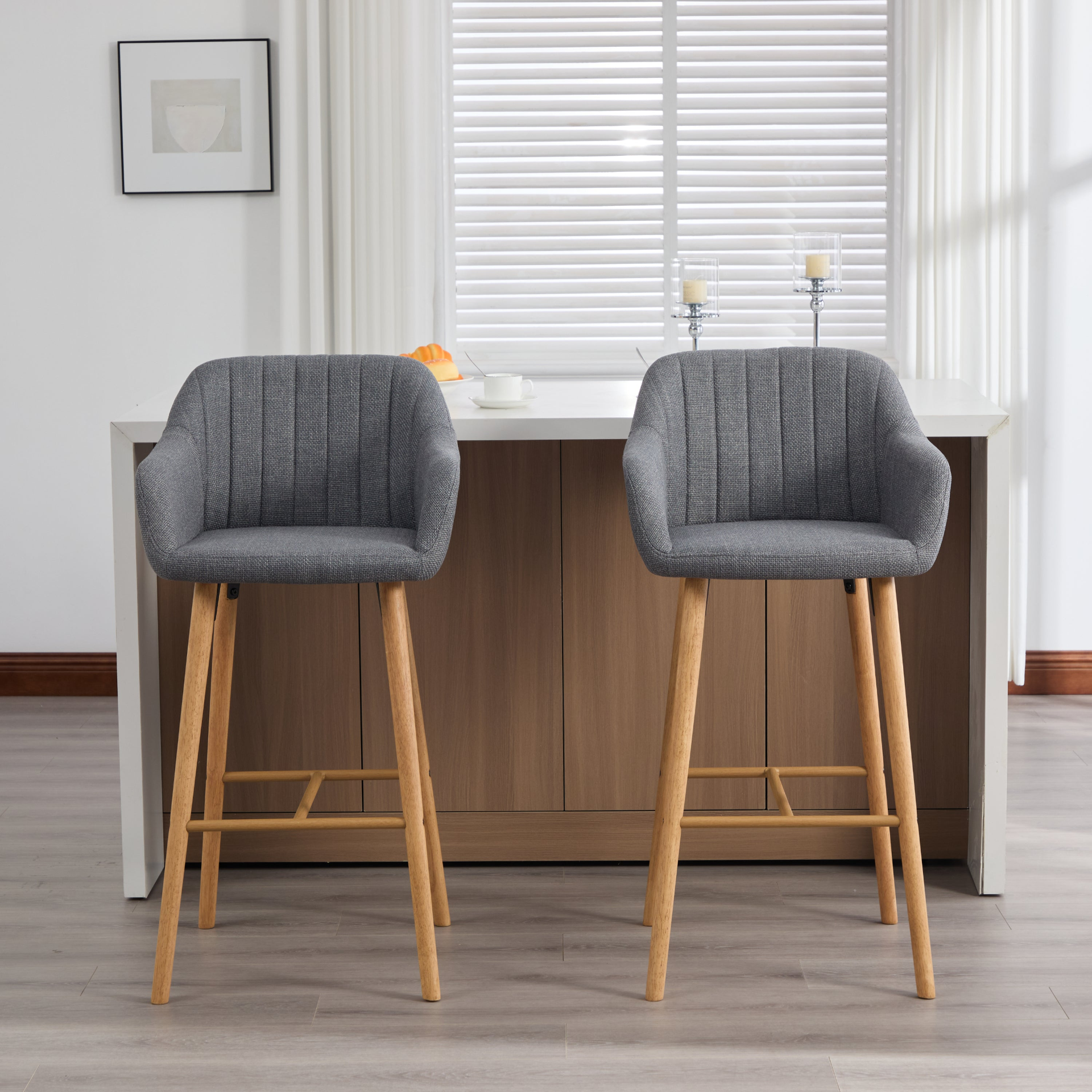 Modern linen upholstered bar stool with back, armrests, footrest, and solid wood legs from Start2Finish furniture.