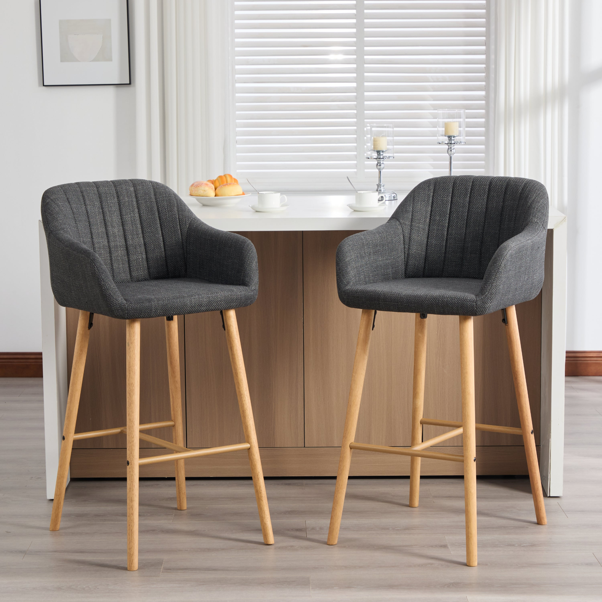 Modern linen upholstered bar stool with backrest, armrests, footrest, and solid wood legs from Start2Finish furniture collection.