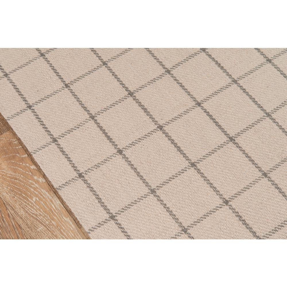 Ivory modern rectangle area rug from Start2Finish, 5 by 8 feet, with a sleek, contemporary design and soft textile surface.