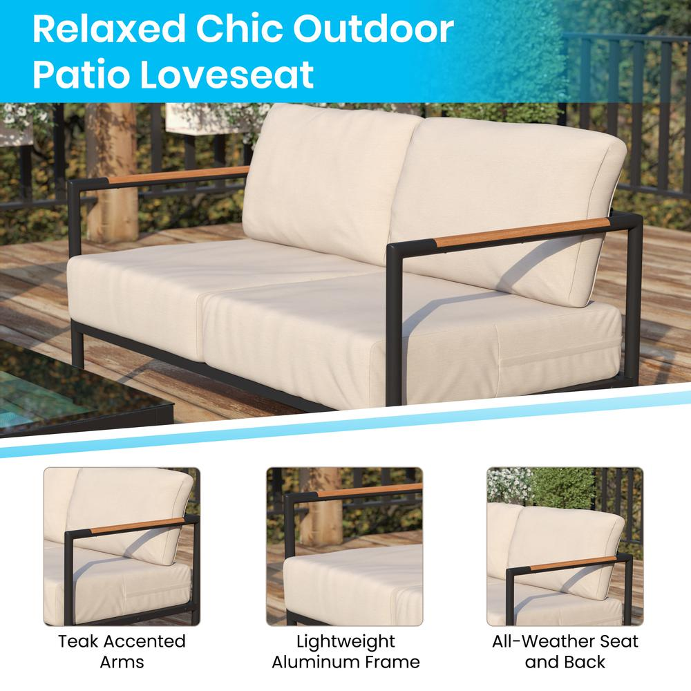 Black patio loveseat with beige cushions, teak accent arms, and cushioned seating for outdoor furniture by Start2Finish.