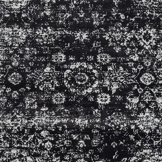 Distressed vintage Persian woven area rug with intricate patterns and warm tones, handcrafted by Start2Finish.