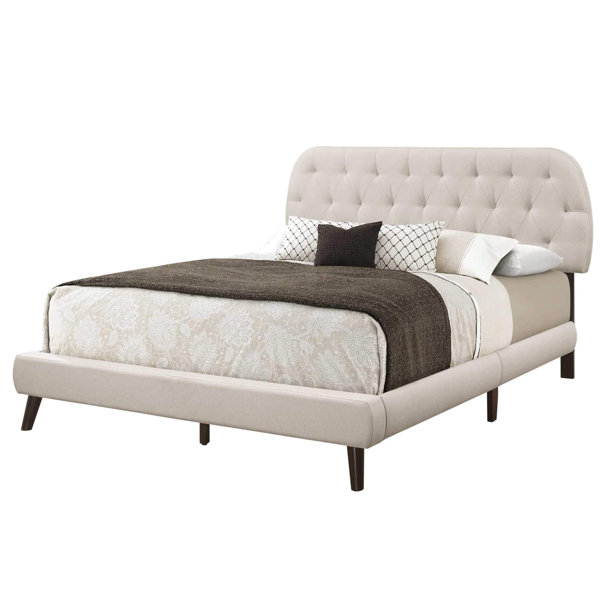 Grey foam and solid wood queen-sized bed by Jade with linen upholstery, measuring 70.5 x 87.25 x 45.25 inches.