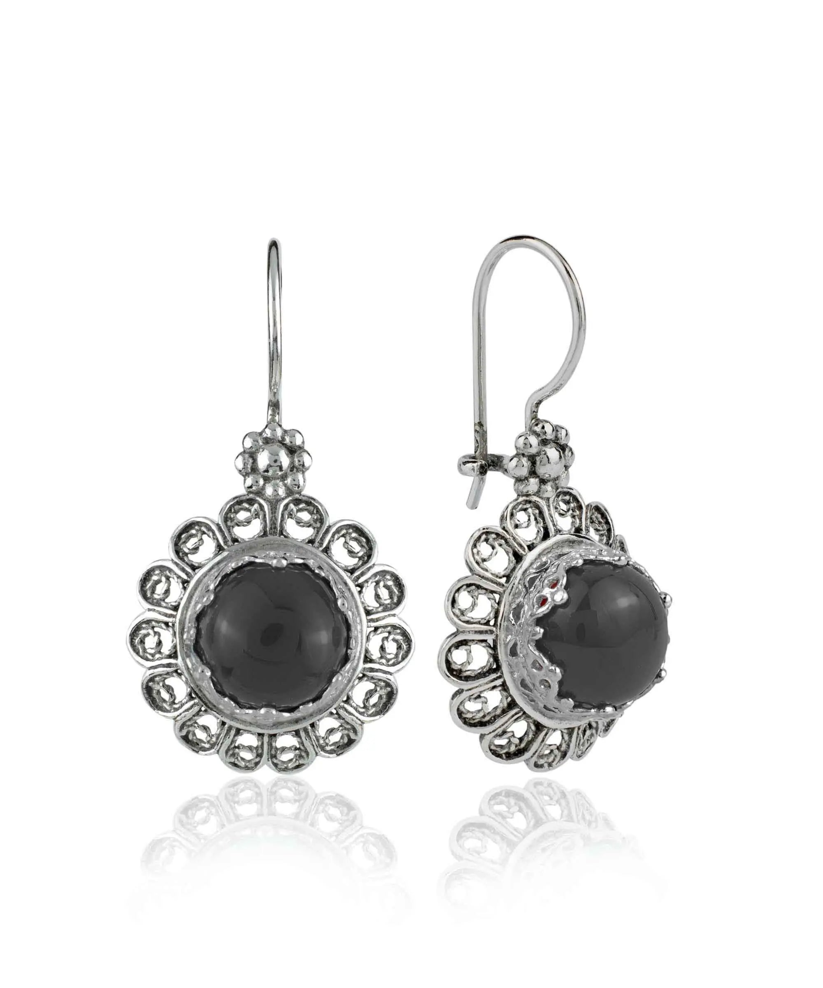 Silver drop earrings with black onyx gemstones and intricate filigree flower designs for women.