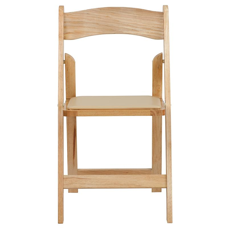 Two HERCULES Series natural wood folding chairs with vinyl padded seats, ideal for versatile indoor and outdoor seating.