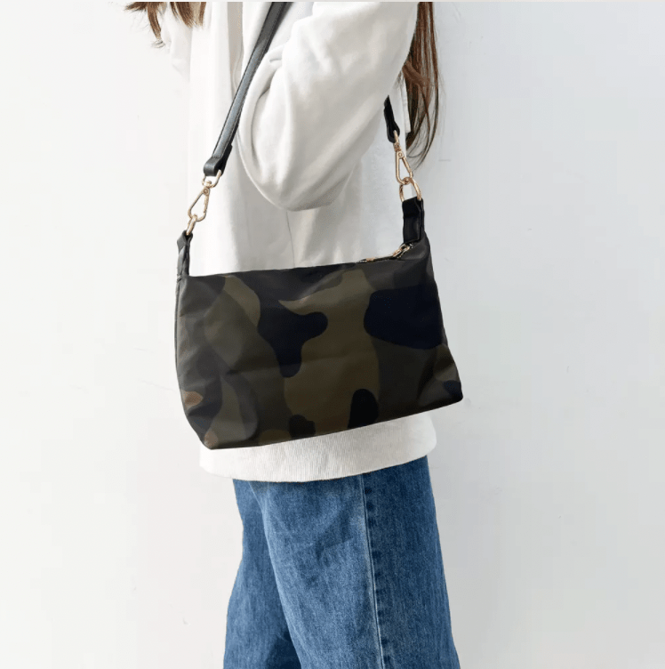 Start2Finish Everly Crossbody accessory with adjustable strap and sleek design, shown in stylish black fabric.