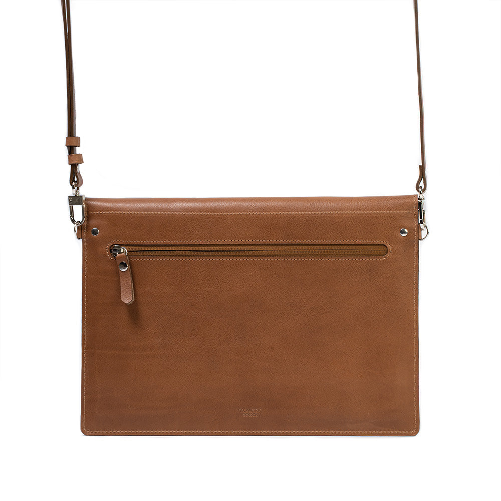 Start2Finish leather MacBook bag with an iPad pocket, stylish accessory for carrying laptops and tablets securely.