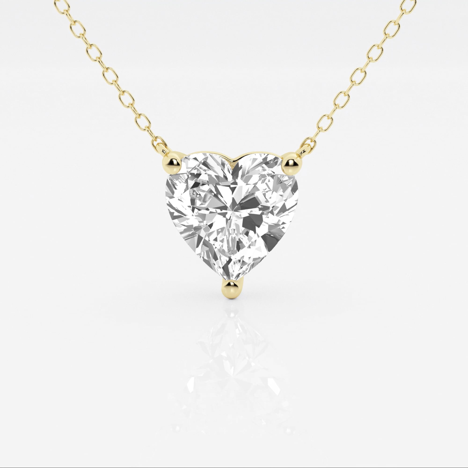 Floating heart-shaped lab-grown diamond pendant necklace in 14K gold, featuring 2.00 CTW F/G VS1 diamonds, AGI certified.
