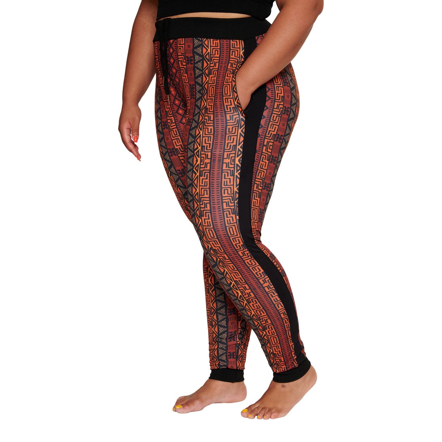 African tracksuit for women by Olive Buckeye, featuring vibrant patterns and comfortable fit in a stylish clothing design.
