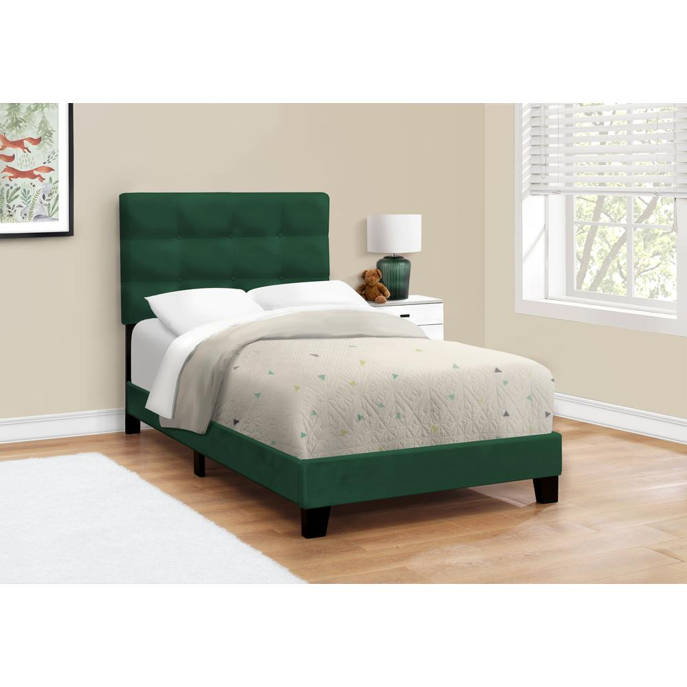 Twin size upholstered bed frame in green velvet with a transitional design, featuring a padded headboard and sturdy wooden construction.