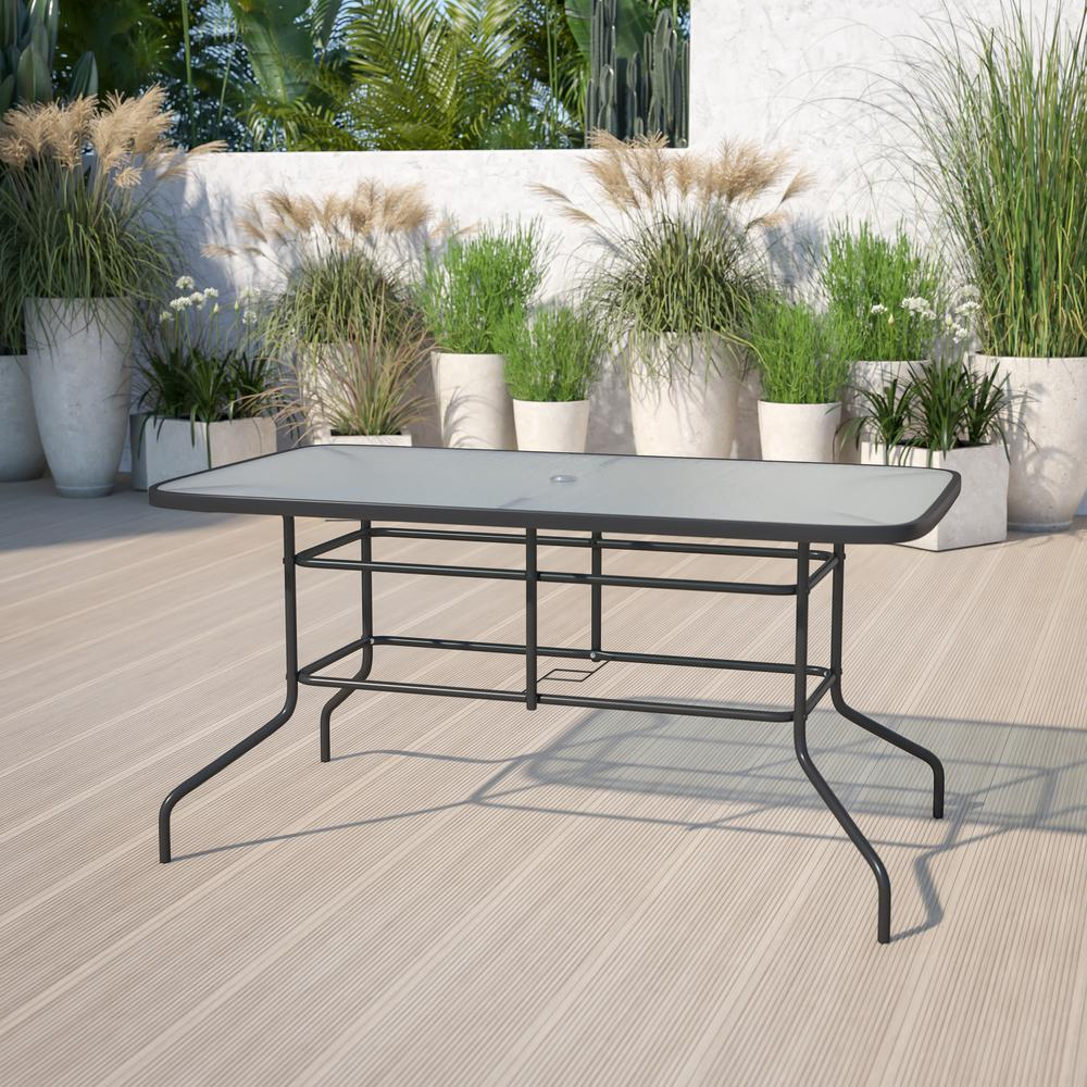 Rectangular glass patio table with seating for six, featuring a sleek design and sturdy frame, ideal for outdoor dining and entertaining.