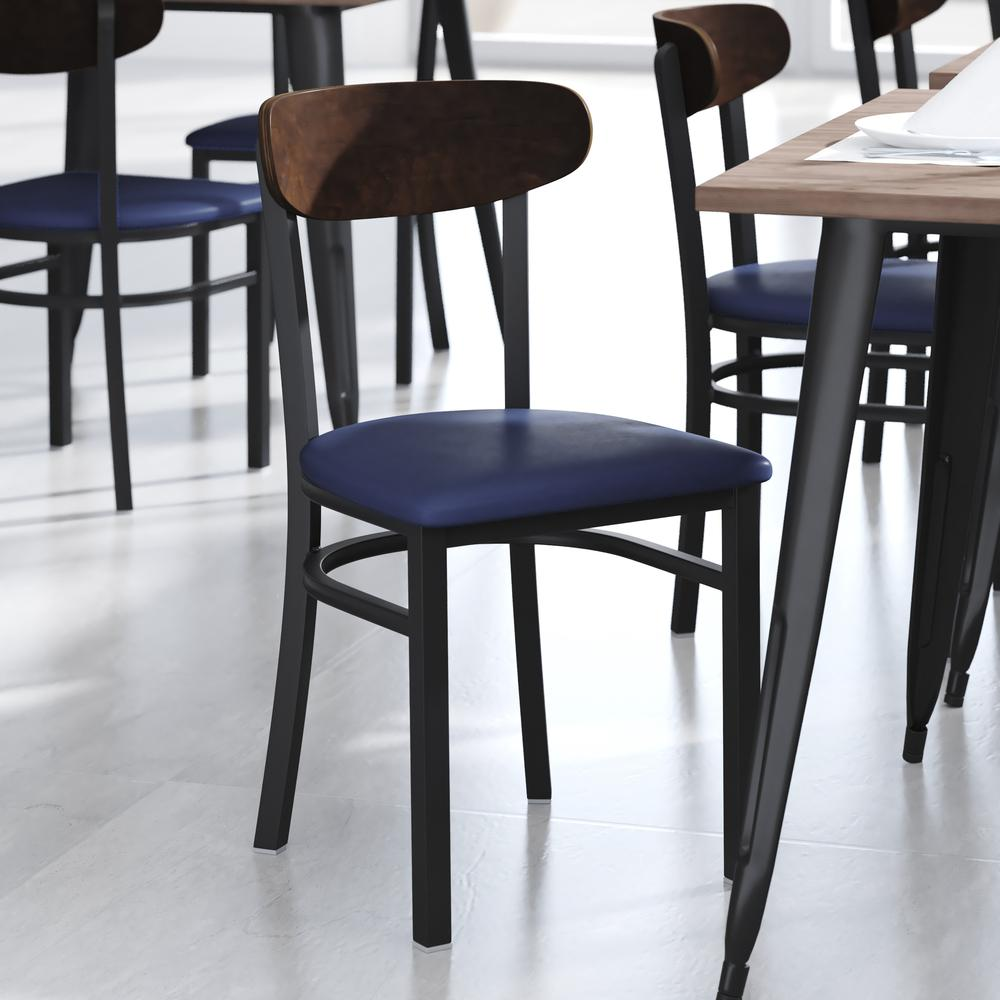 Commercial dining chair with vinyl upholstered seat and wood boomerang back, designed for restaurant furniture.