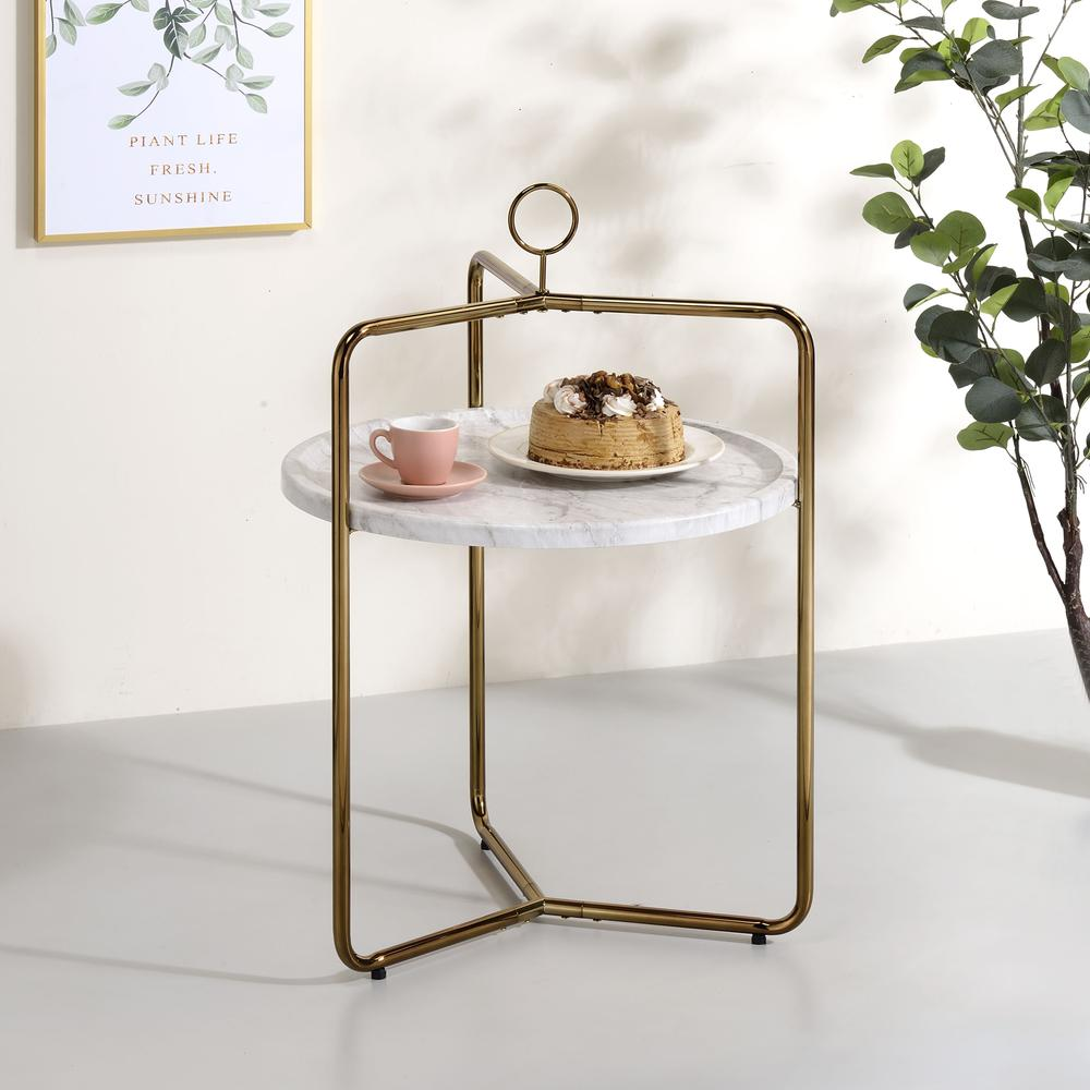 White and gold Miro side table by Start2Finish, showcasing a sleek modern furniture design with a round top and slim legs.