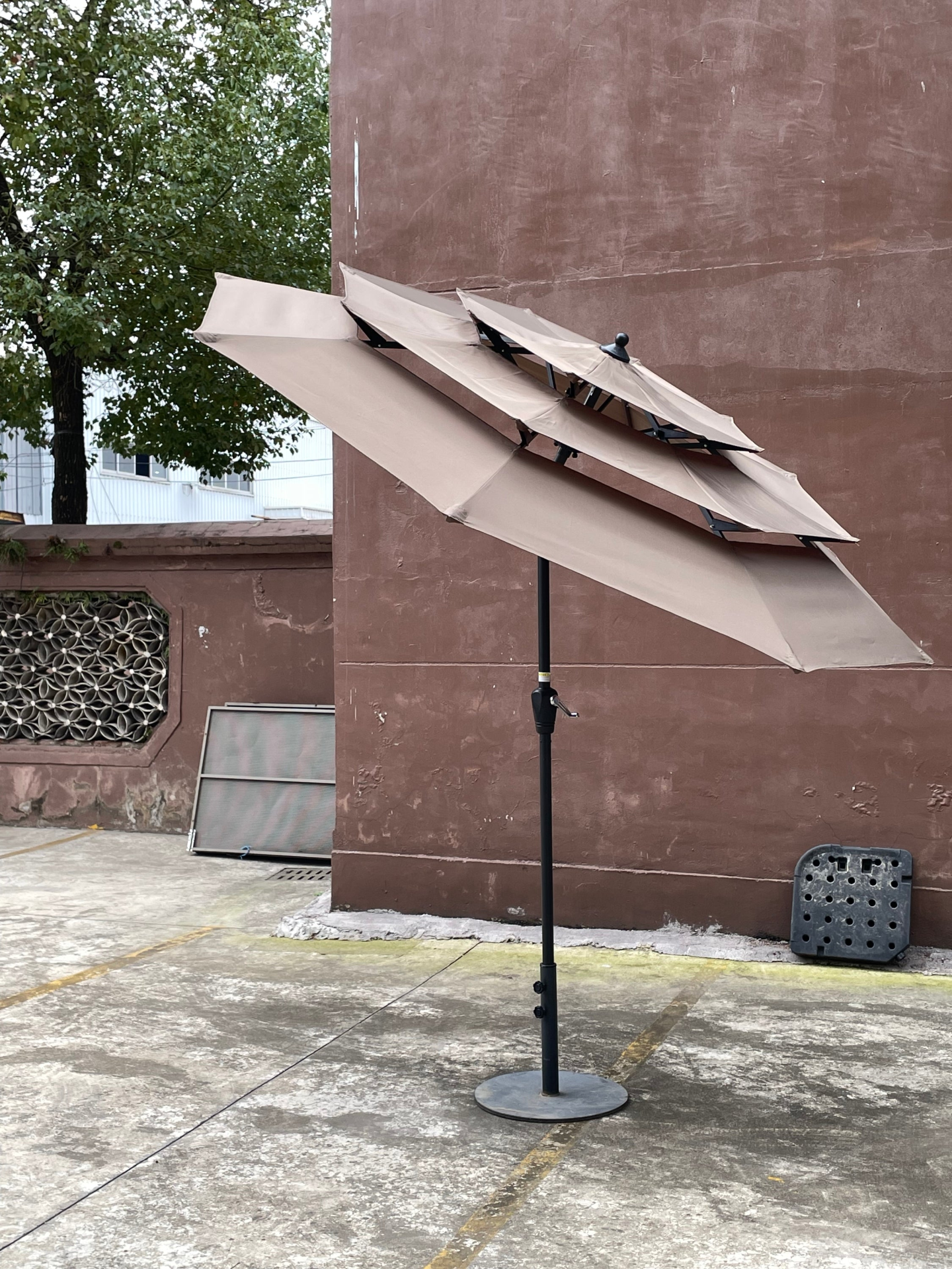 Red 9 ft metal outdoor patio umbrella with tilt and crank, ideal for decks, poolsides, and patios by Start2Finish.