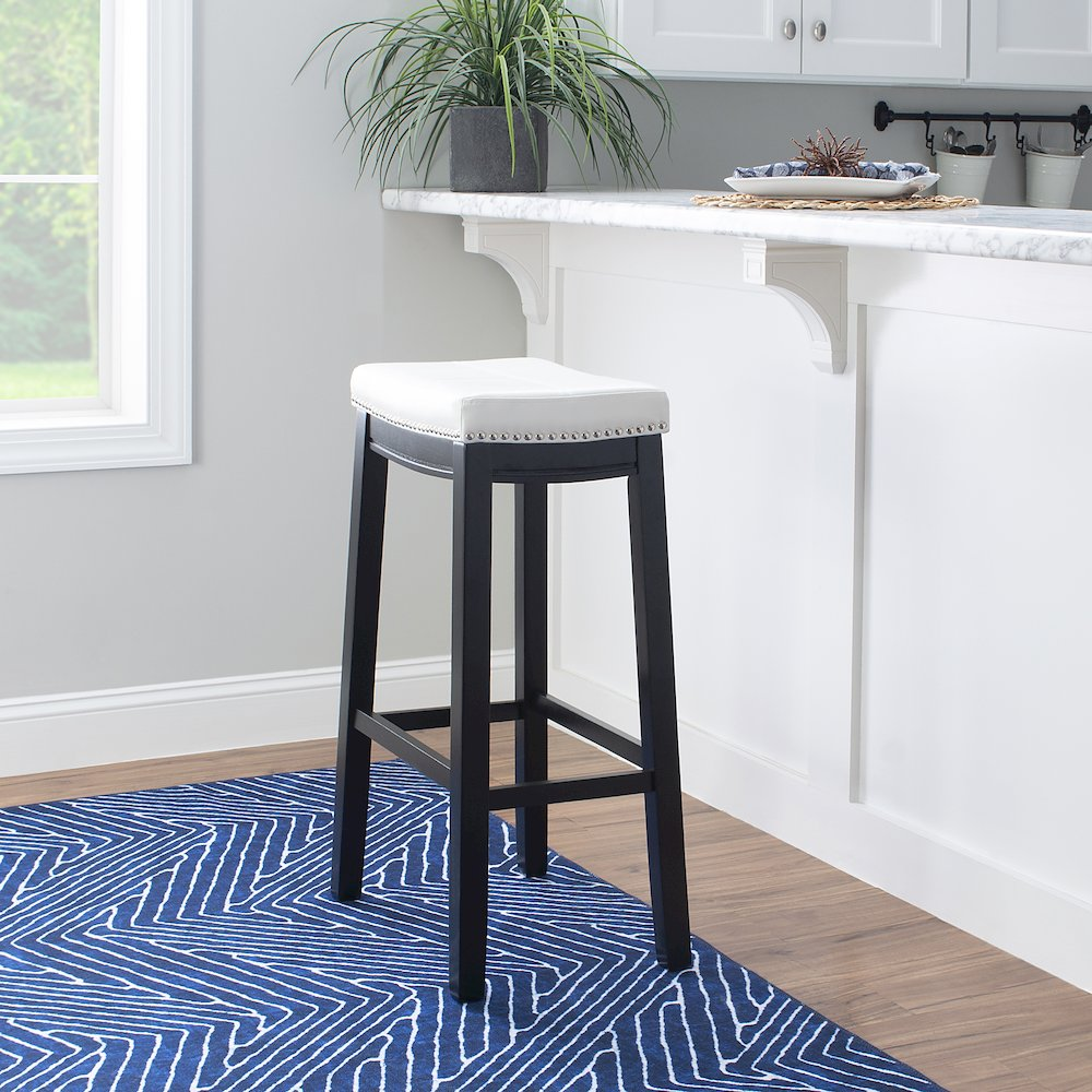 Claridge white PU barstool by Start2Finish featuring a sleek design with a cushioned seat and sturdy metal legs.
