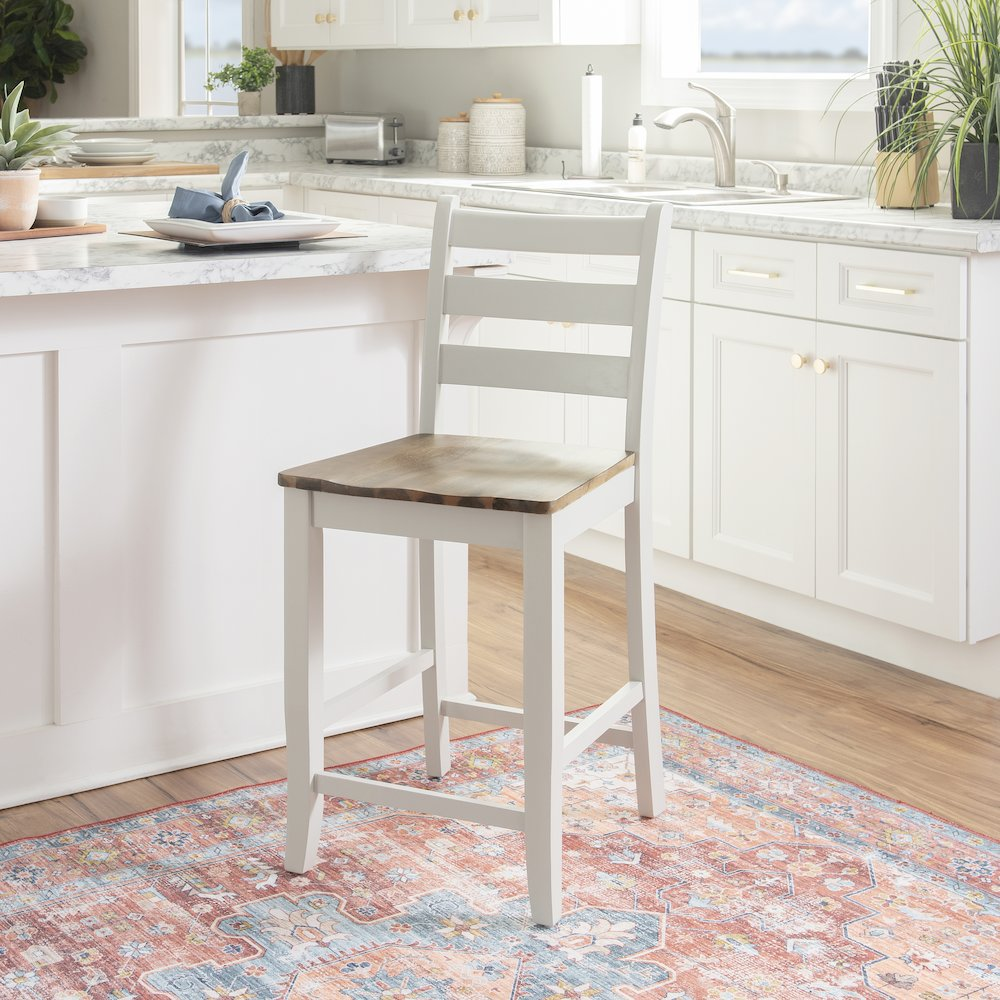 Start2Finish Colm Counter Stool with wooden legs and upholstered seat, shown from a side view.