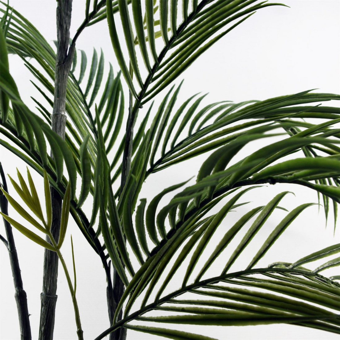 Artificial palm tree in a decorative planter, ideal for indoor or outdoor decor, by Start2Finish.