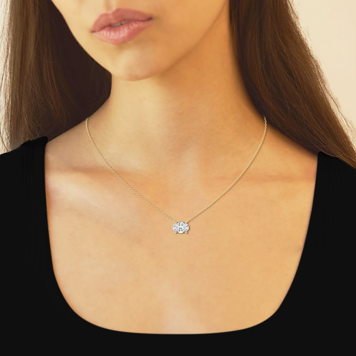 Oval lab-grown diamond solitaire pendant in white and yellow gold, featuring a 1.00 Ctw center stone on a delicate chain.