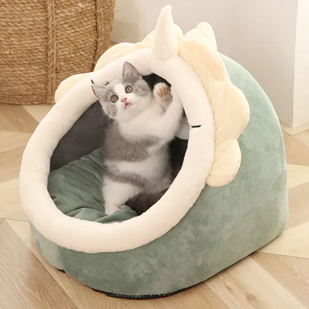 Yellow Pandora dinosaur-shaped pet house with cozy bed and toy inside, perfect for small pets.