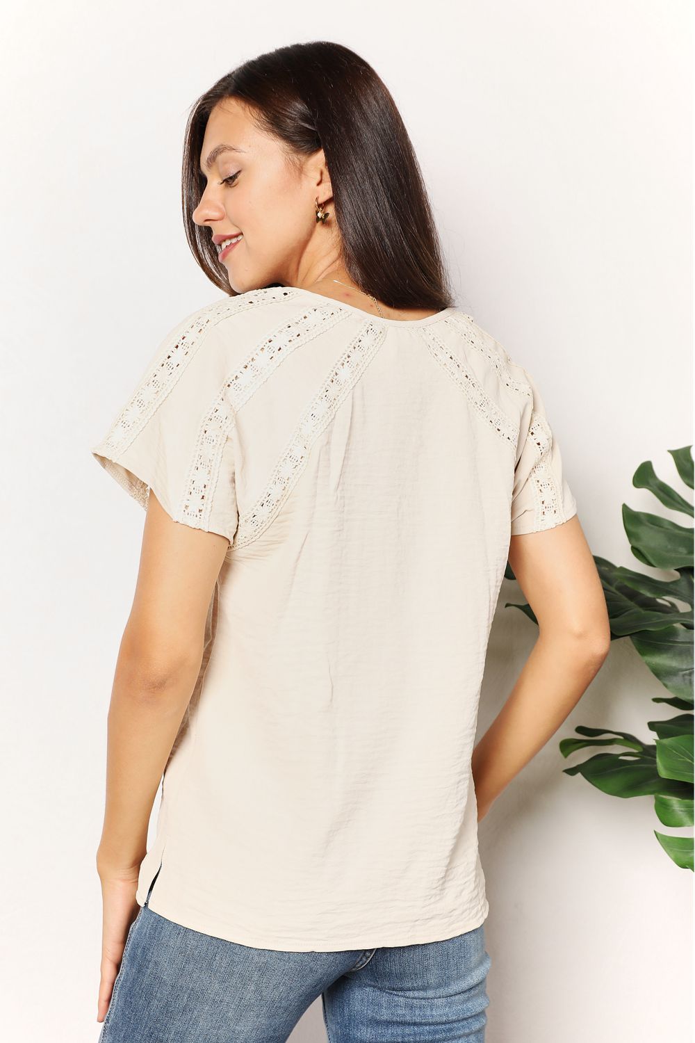 Pear Daisy crochet short sleeve top with button details, featuring a double take design in a cozy home and garden style.