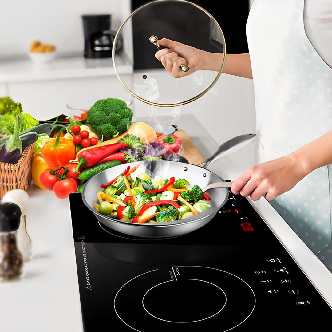 Start2Finish SOGA stainless steel 10-inch frying pan, induction-compatible, with a polished surface for home cooking.