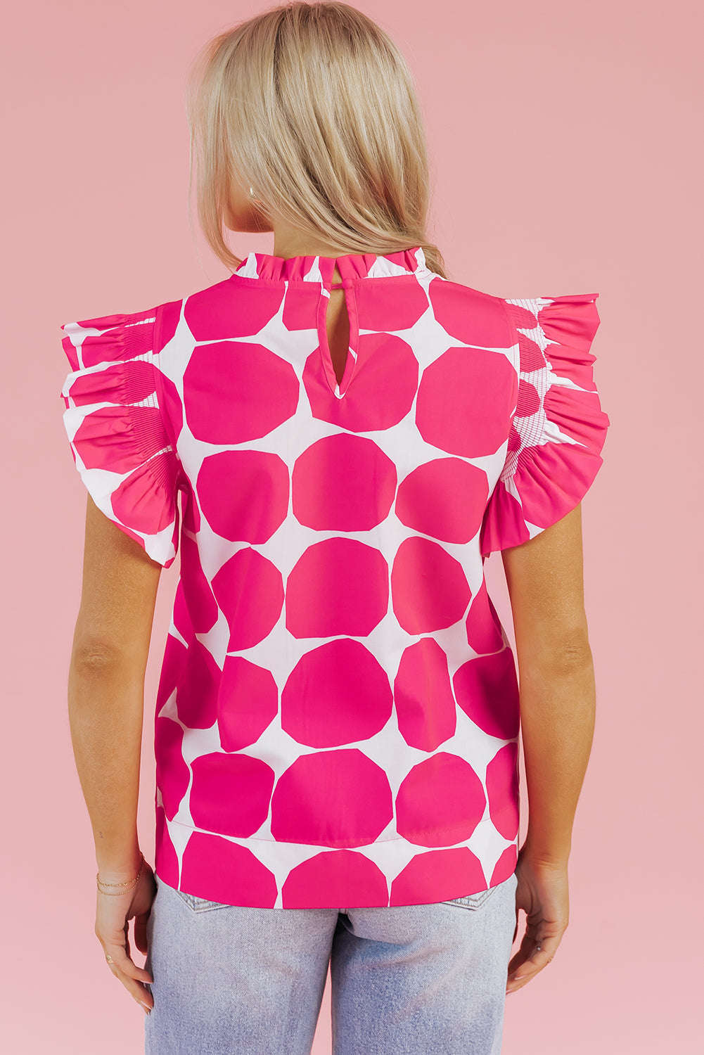 Pink rose bubblegum patterned frilled collar flutter sleeve top by Carmine Juneberry, showcasing a stylish and feminine design.