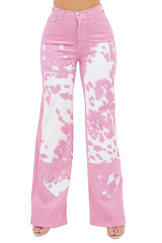 Jade Icarus Rodeo Wide Leg Pink Jeans displayed on a model, showcasing the relaxed fit and stylish wide-leg design.