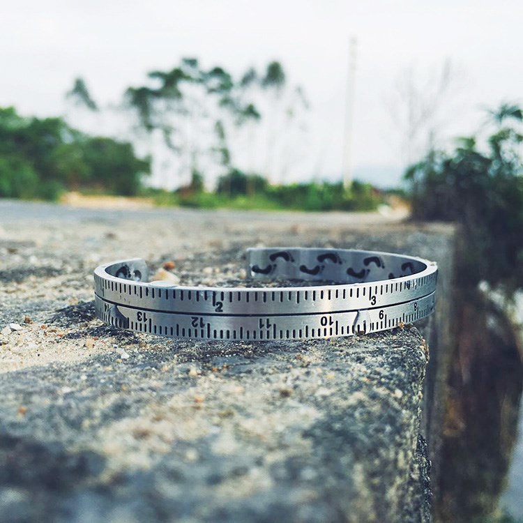Fuchsia Molly ruler bracelet with silver-tone metal and engraved measurements, displayed on a white background.