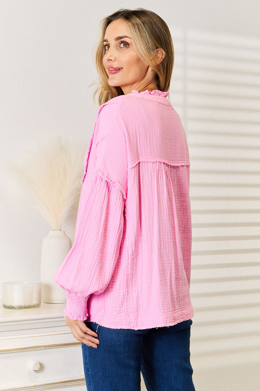 Pear Daisy Double Take exposed seam buttoned notched neck blouse, showcasing the stylish design and fabric details.