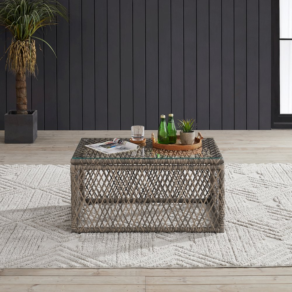 Start2Finish Granite Bay wicker outdoor coffee table with glass top, featuring a natural woven design for patio or garden use.