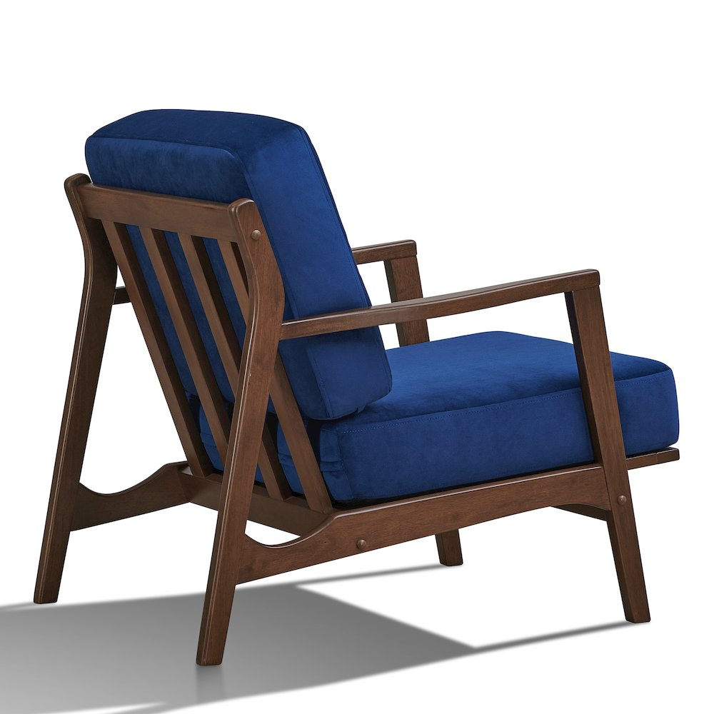 Blue Jasper accent armchair with solid wood frame and velvet upholstery, featuring cushioned seat and stylish armrests.