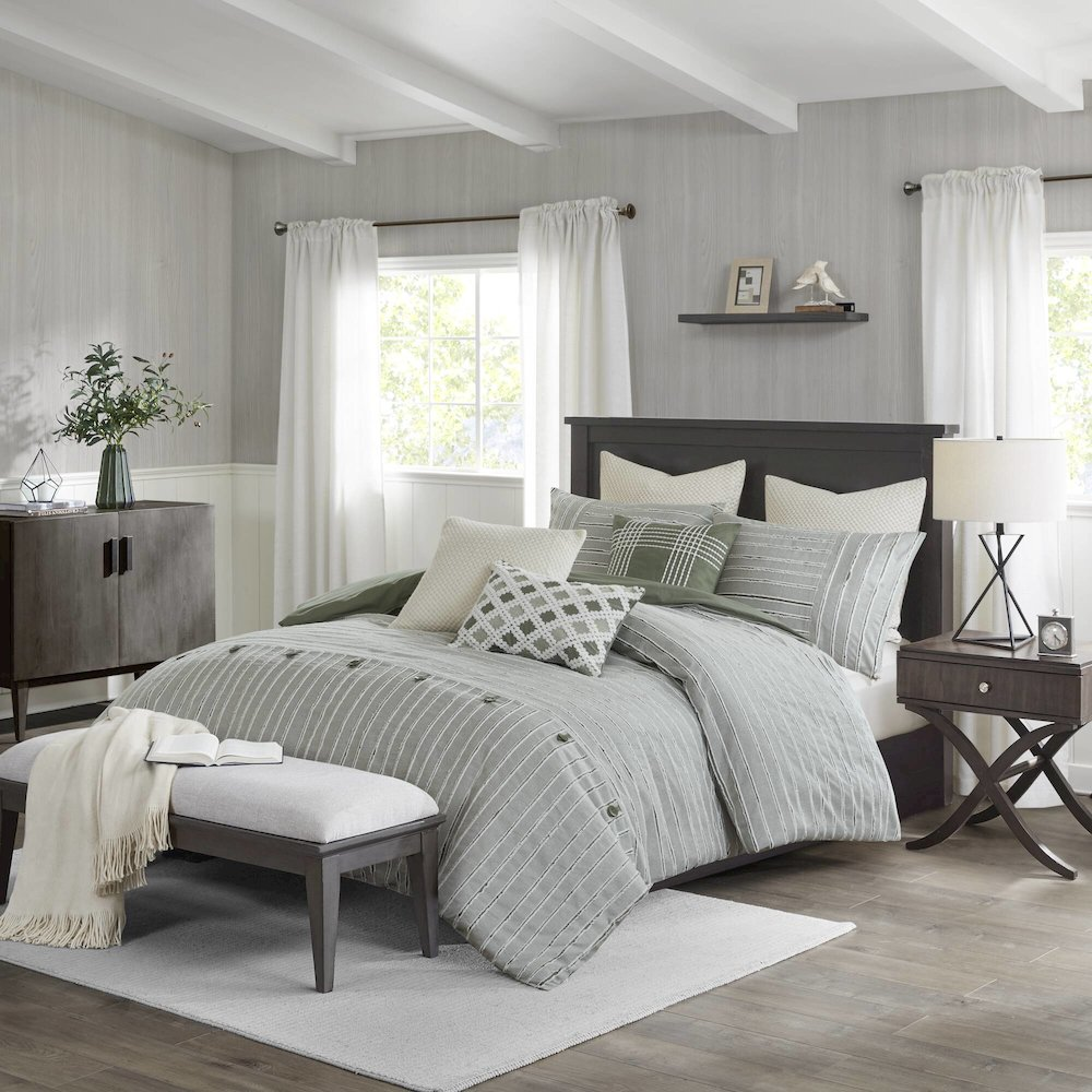 Oversized cotton comforter set with euro shams and throw pillows, featuring soft, breathable fabric and cozy bedding design.