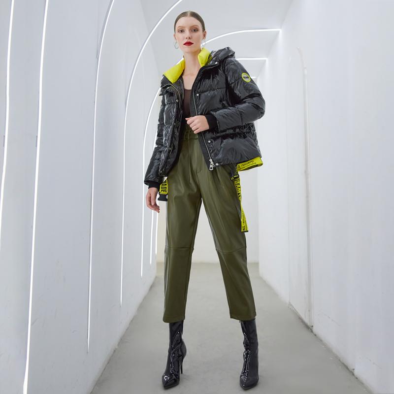 Women’s shiny Jade winter parka coat with hood, warm and stylish, featuring a sleek, shiny exterior and a cozy fit for cold weather.