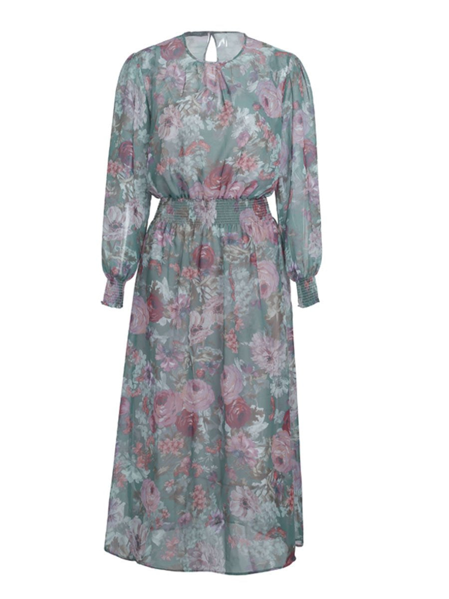 Elegant floral print long dress for women by Fuchsia Simba, two-piece style with flowing fabric and vibrant floral pattern.