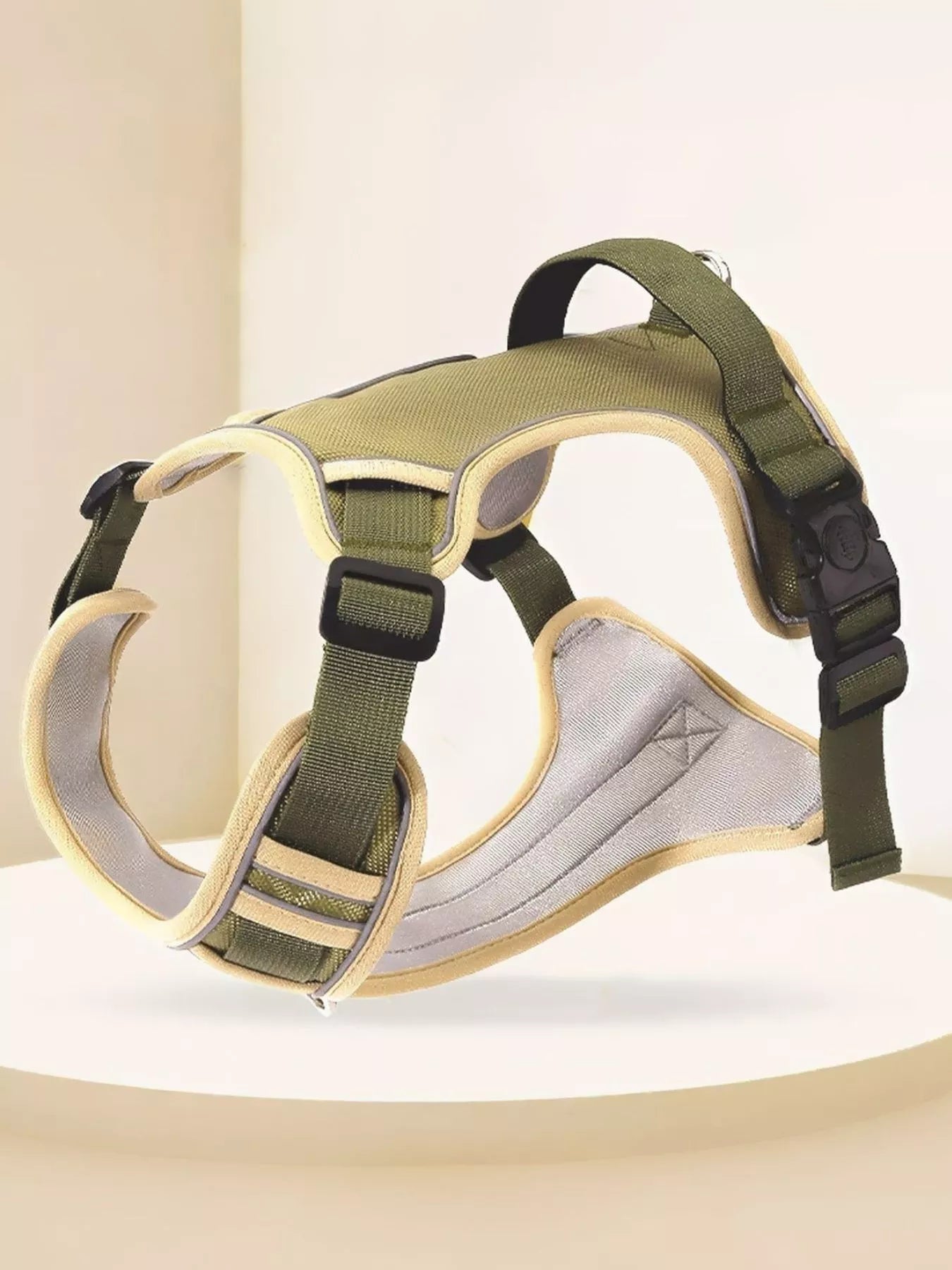 Adjustable reflective pet harness by Pear Daisy with padded straps and secure buckle for outdoor walks and safety.