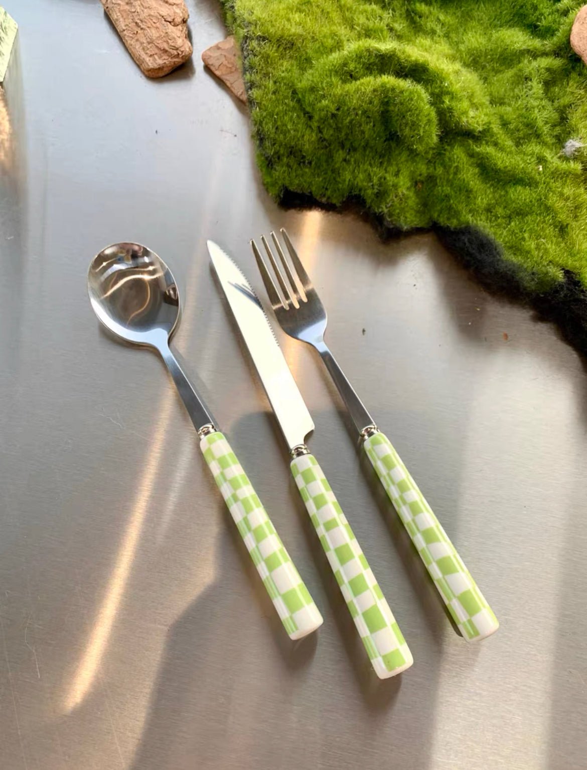 Six-piece set of modern checkered flatware by Inspecial Home, stylish stainless steel utensils for home dining decor.